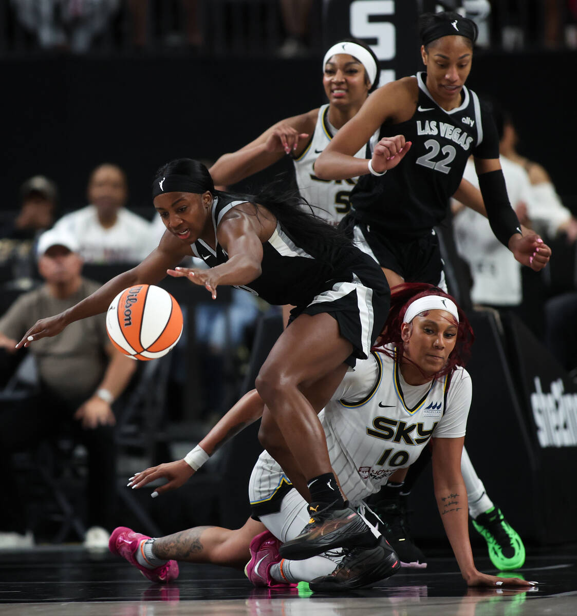 Las Vegas Aces guard Jackie Young (0) steals the ball from Chicago Sky center Kamilla Cardoso ( ...