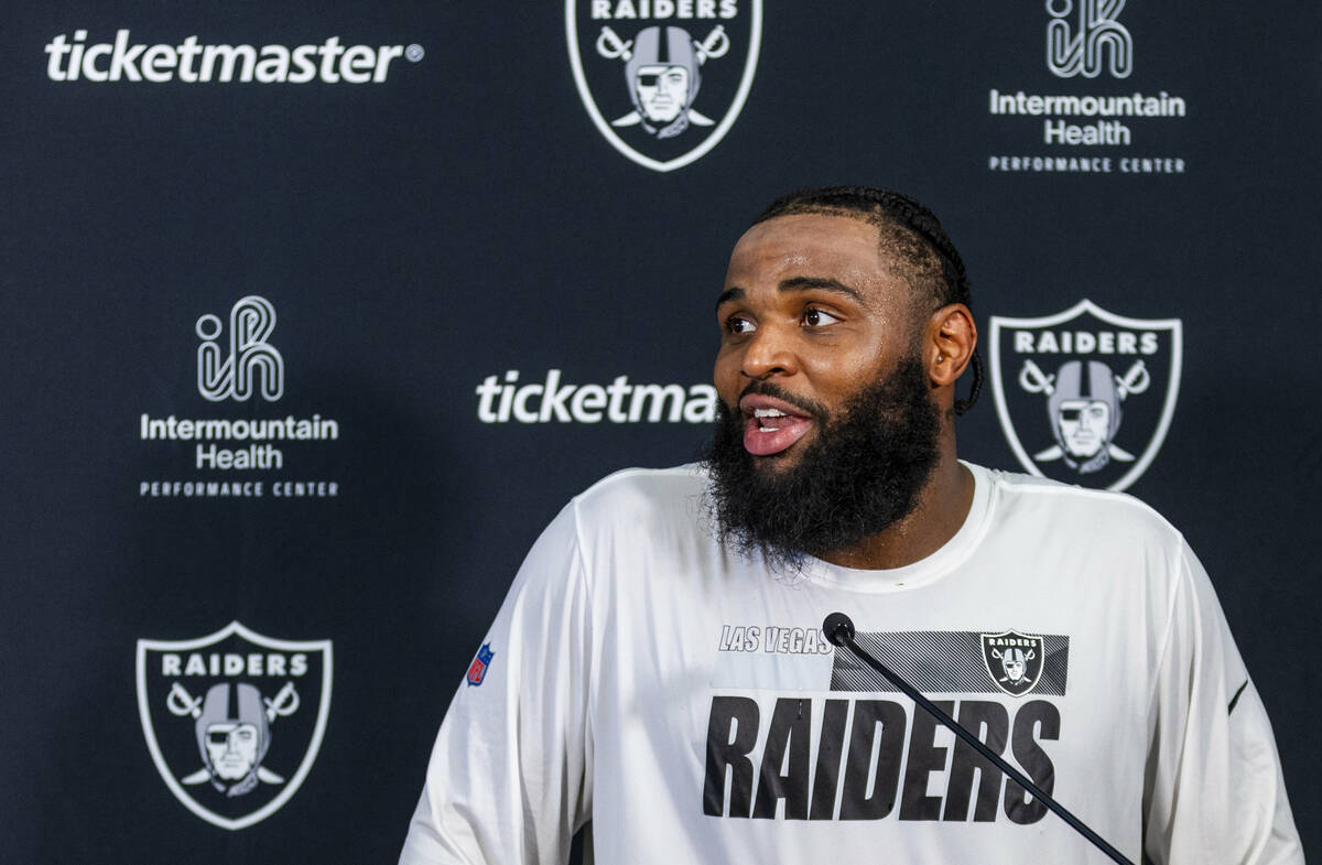 Raiders defensive tackle Christian Wilkins (94) answers a media question following practice at ...