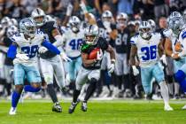 Raiders wide receiver Tre Tucker (11) makes a big kickoff return against the Dallas Cowboys dur ...