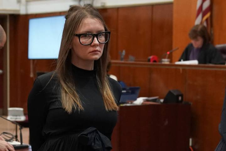 Fake German heiress Anna Sorokin, also known as Anna Delvey, is led away after being sentenced ...