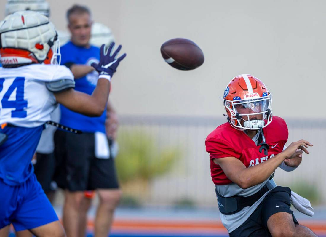 Bishop Gorman quarterback Melvin Spicer IV (#2) laterals the ball to running back Myles Norman ...