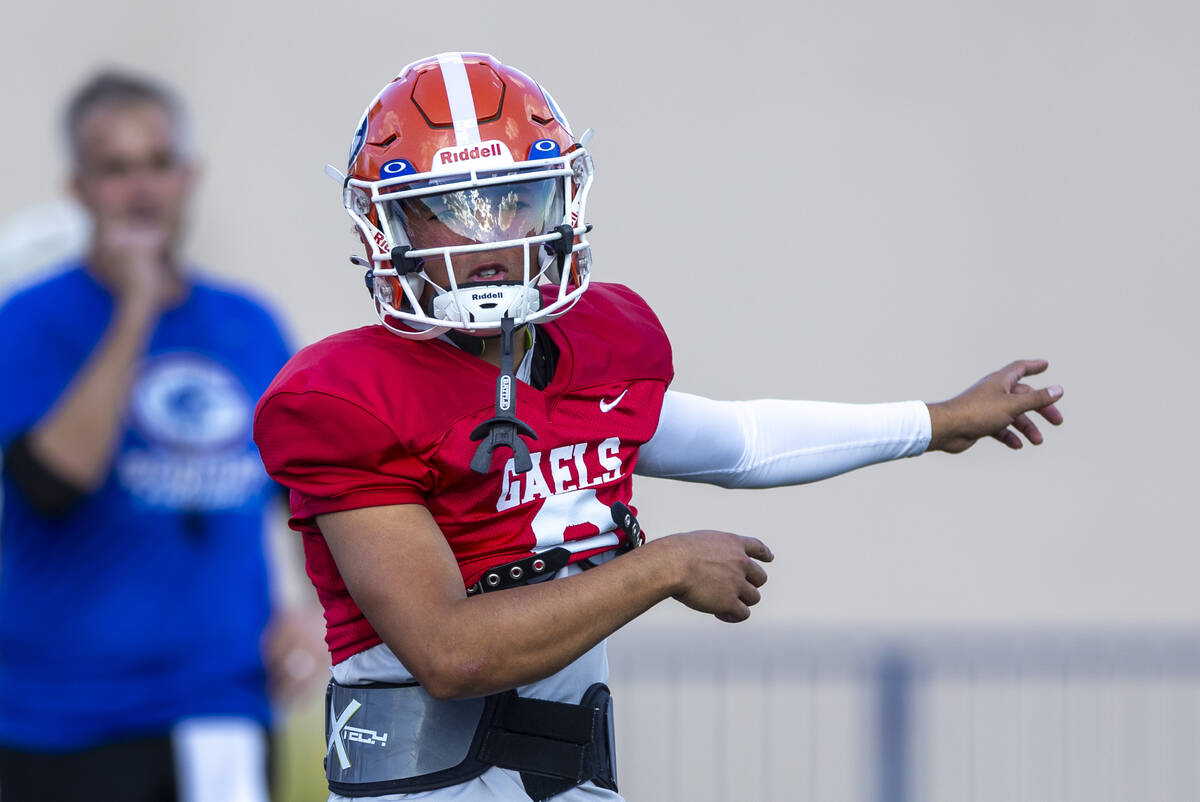 Bishop Gorman quarterback Melvin Spicer IV (2) directs a teammate during football practice on T ...