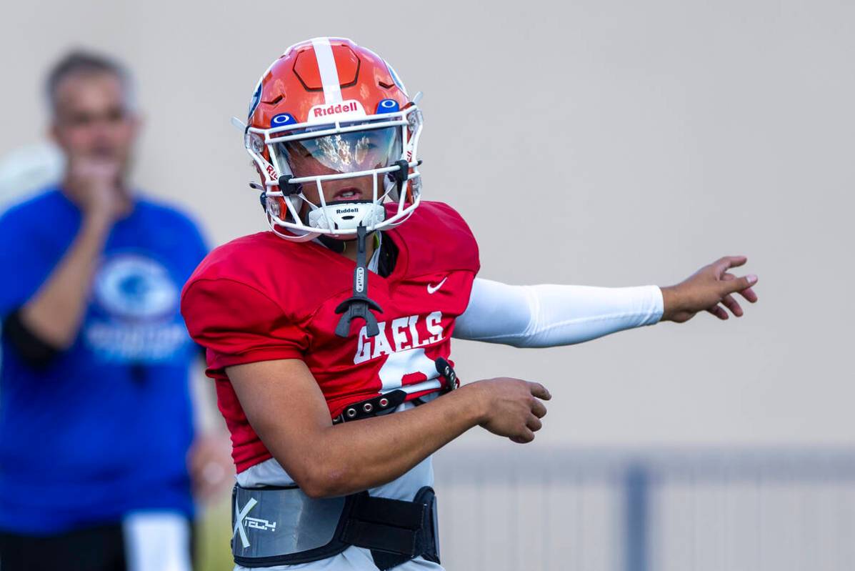 Bishop Gorman quarterback Melvin Spicer IV (2) directs a teammate during football practice on T ...