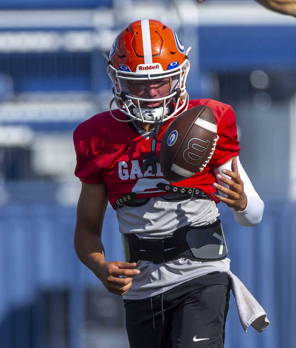 Bishop Gorman quarterback Melvin Spicer IV (#2) tosses a ball during football practice on Tuesd ...