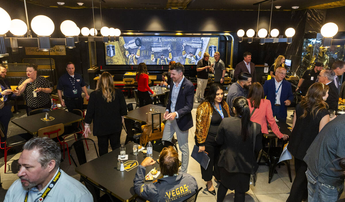 Guests enjoy the new space during the grand opening celebration for the Vegas Born Restaurant i ...