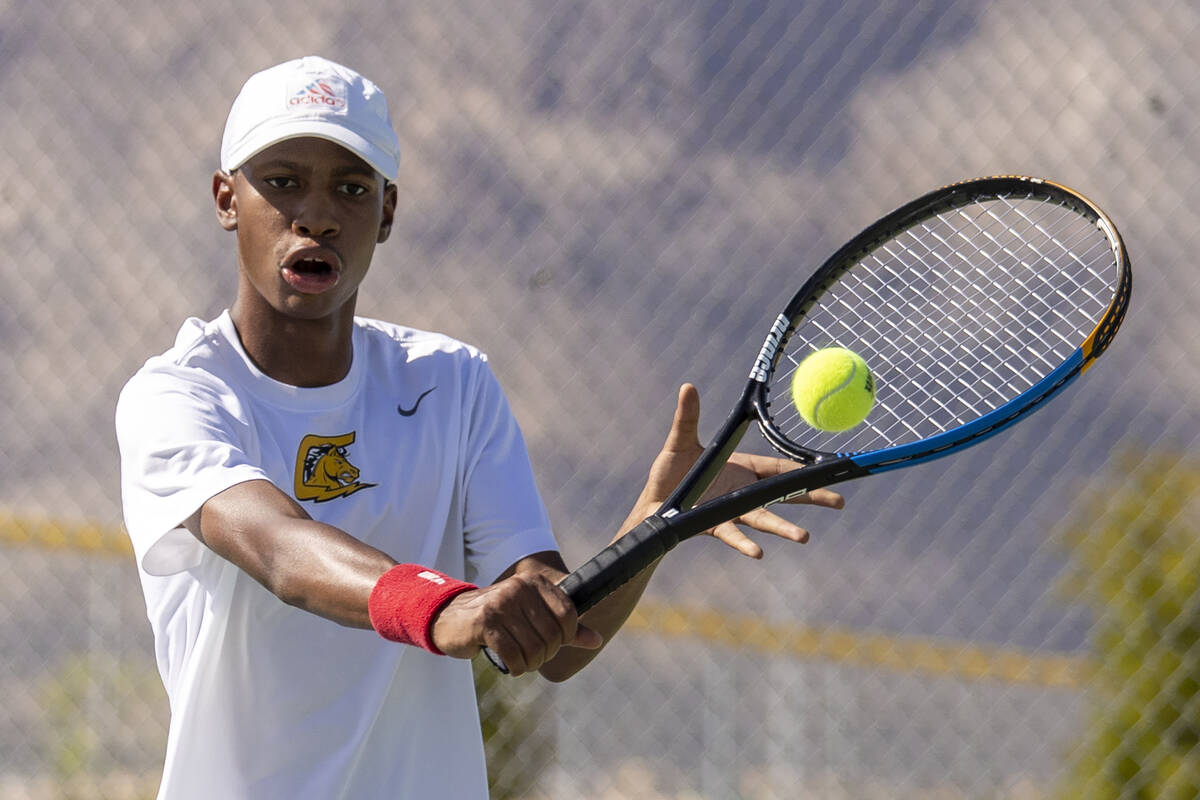 Clark sophomore Marcus Vickers competes during the high school tennis matches against Palo Verd ...