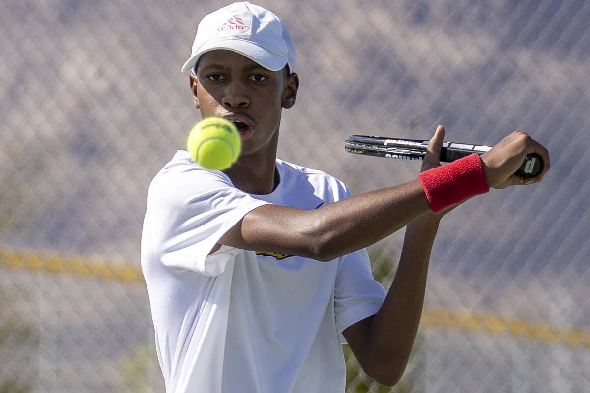 Clark sophomore Marcus Vickers competes during the high school tennis matches against Palo Verd ...