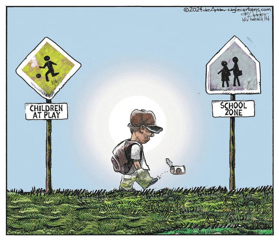 A kid walks from Kid's at play to School Zone representing back to school for many kids in Nort ...