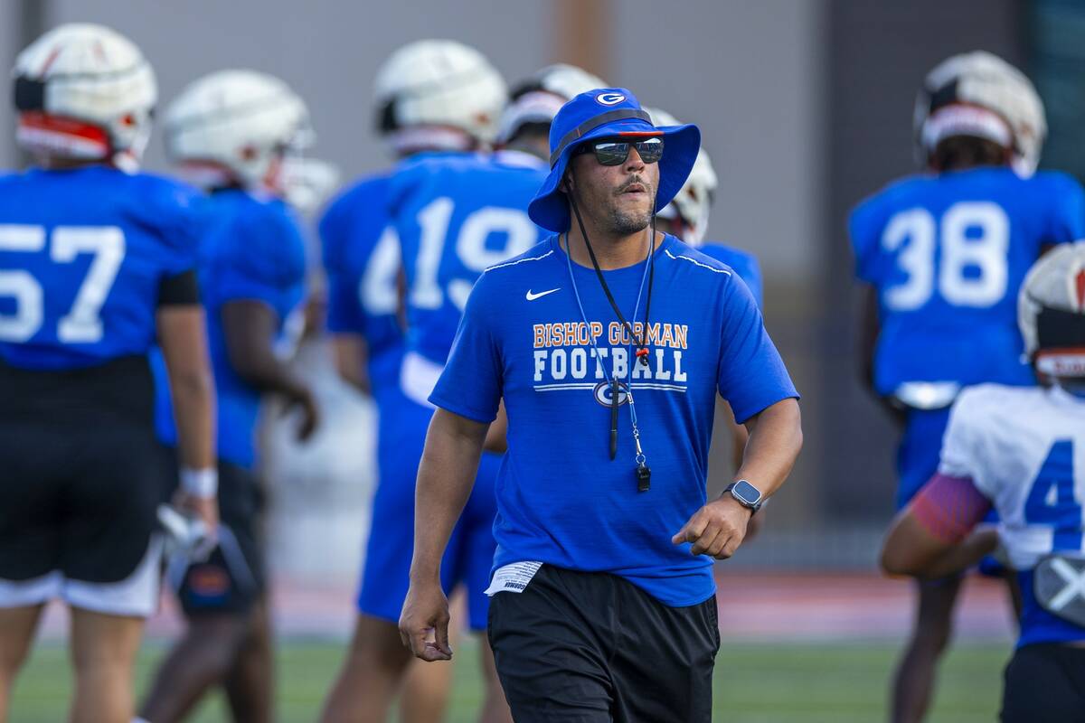 Bishop Gorman coach Brent Browner walks up the field during football practice on Tuesday, Sept. ...