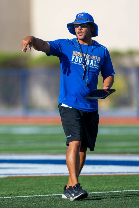 Bishop Gorman head coach Brent Browner directs his players during football practice on Tuesday, ...