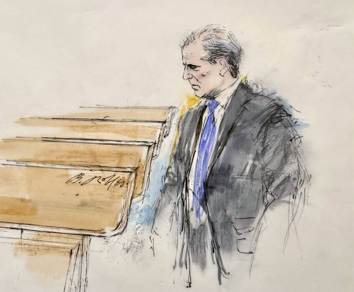 This courtroom sketch shows Hunter Biden entering a federal courtroom for jury selection for hi ...