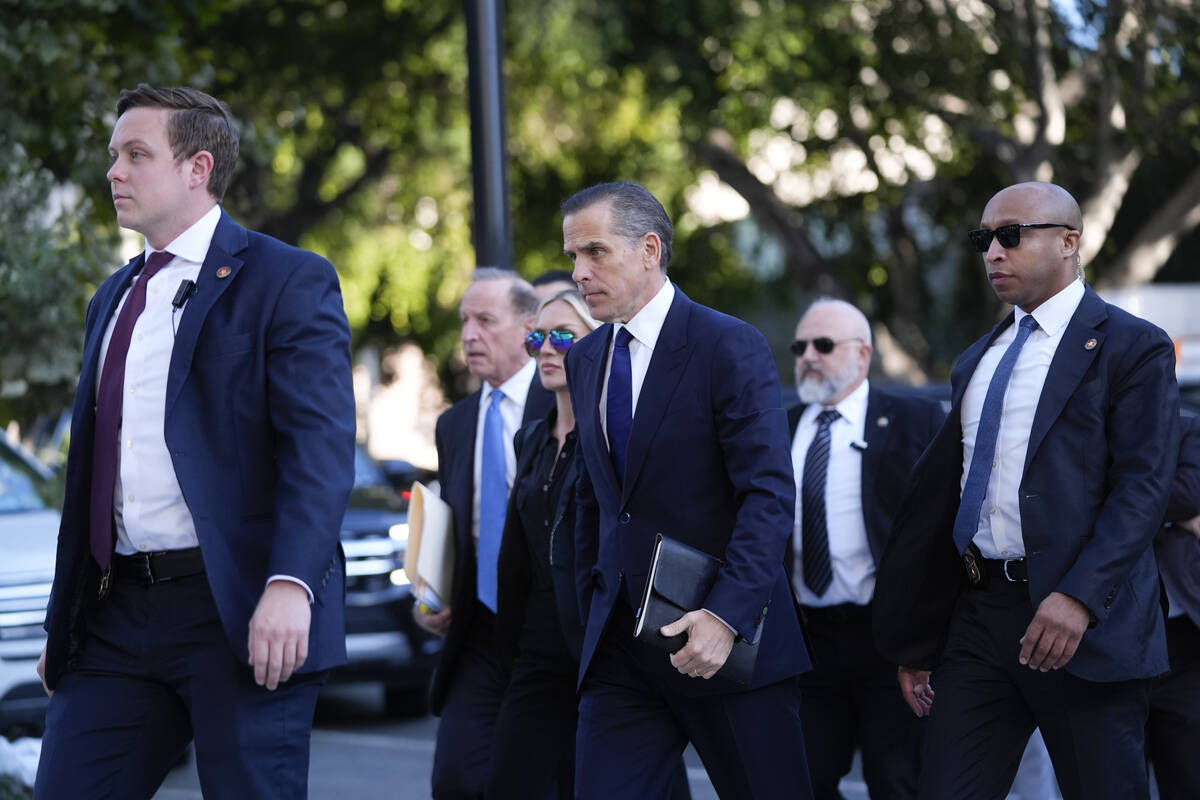 Hunter Biden arrives in federal court for jury selection for his trial on felony tax charges Th ...