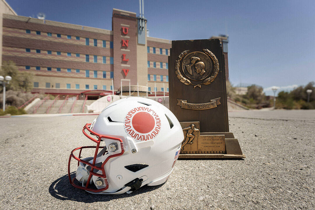 Football 1974 Team 50th Anniversary helmet and NCAA football trophy at Sam Boyd Stadium on Sept ...