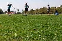 People work on their swings at Boulder City Golf Course, on Thursday, Sept. 5, 2024. (Bizuayehu ...