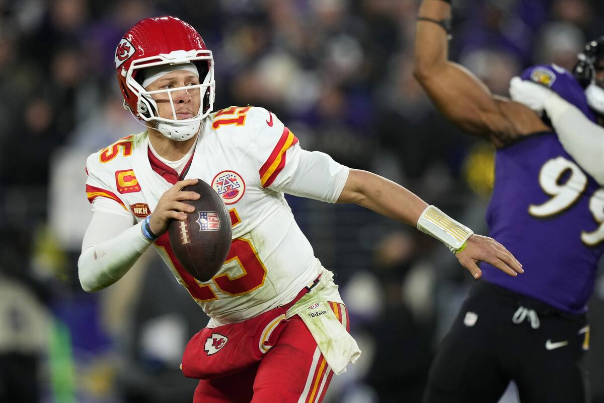 Kansas City Chiefs quarterback Patrick Mahomes (15) looks to pass during the second half of the ...