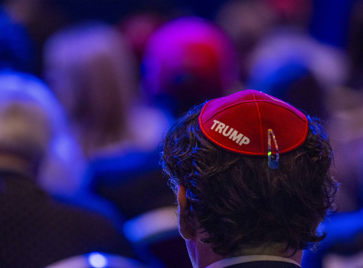 An attendee wears a yarmulke with Trump labeled on it during the Republican Jewish Coalition&#x ...