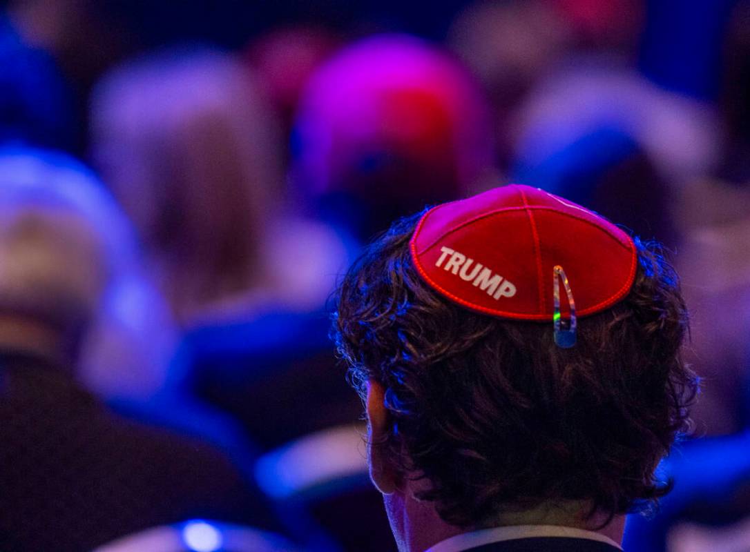 An attendee wears a yarmulke with Trump labeled on it during the Republican Jewish Coalition&#x ...