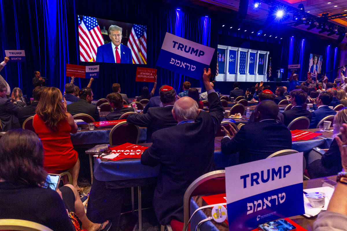 Former President Donald Trump speaks to attendees via satellite during the Republican Jewish Co ...