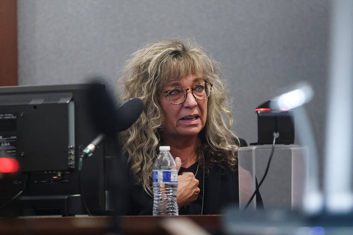 District Judge Mary Kay Holthus becomes emotional as she testifies against Deobra Redden, who f ...