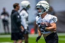 Raiders running back Dylan Laube (23) runs the ball during practice at the Intermountain Health ...