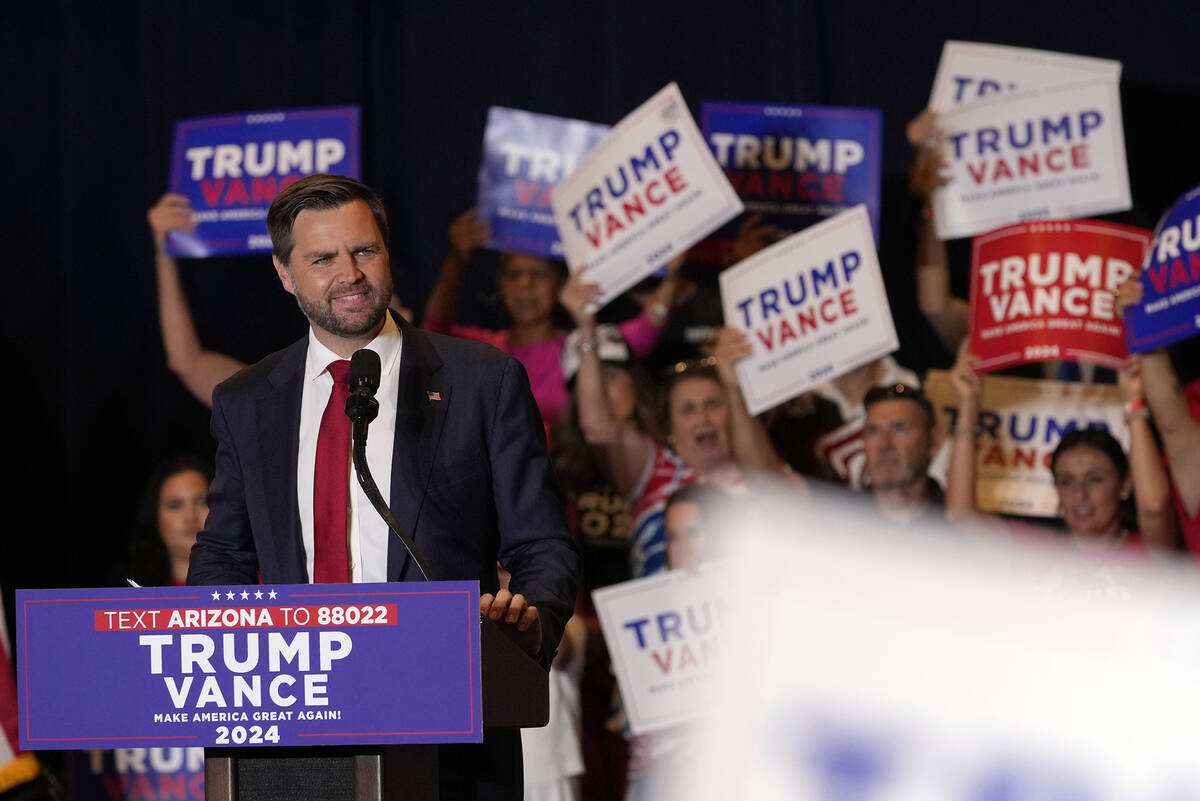 Republican vice presidential nominee Sen. JD Vance, R-Ohio, speaks at a campaign event, Thursda ...