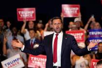 Republican vice presidential nominee Sen. JD Vance, R-Ohio, gestures to supporters at a campaig ...