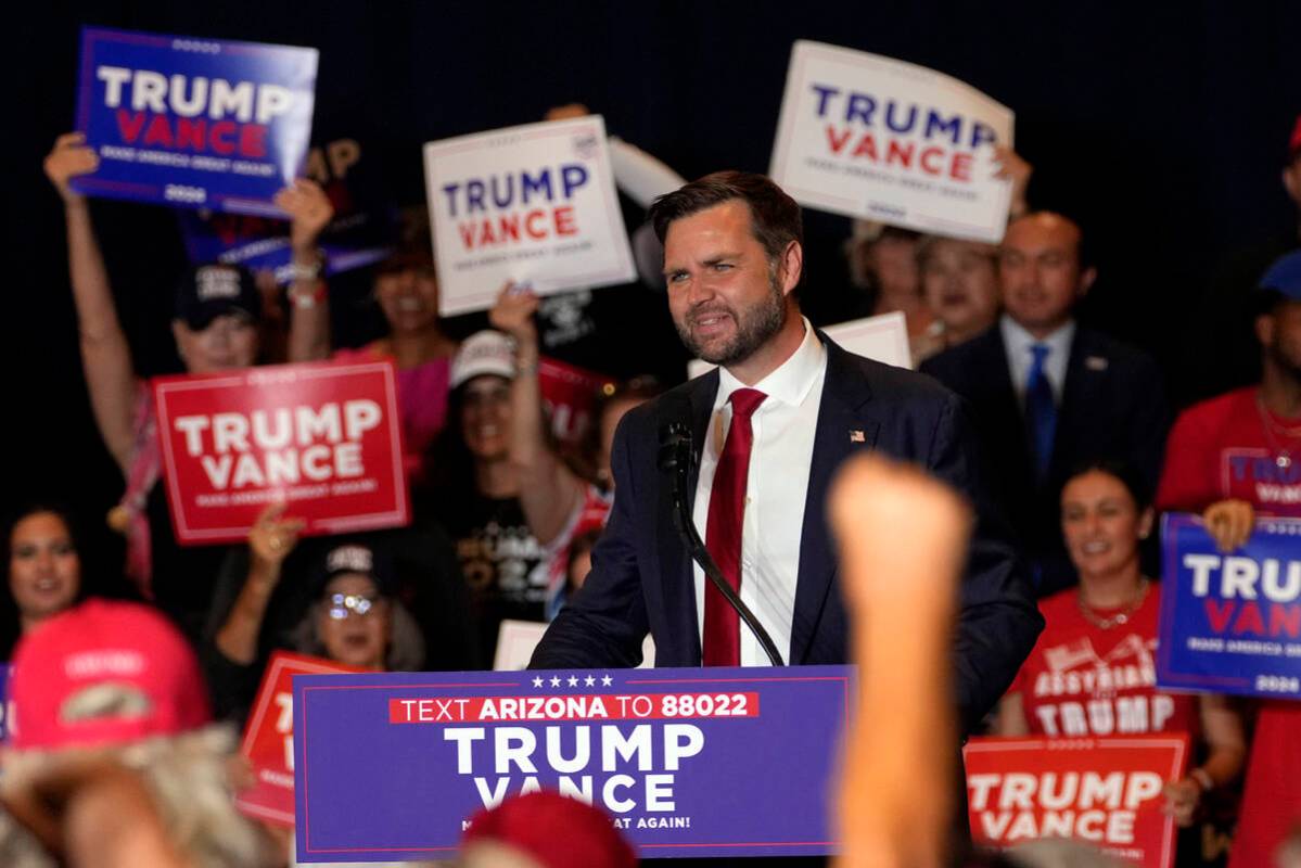 Republican vice presidential nominee Sen. JD Vance, R-Ohio, speaks at a campaign event, Thursda ...