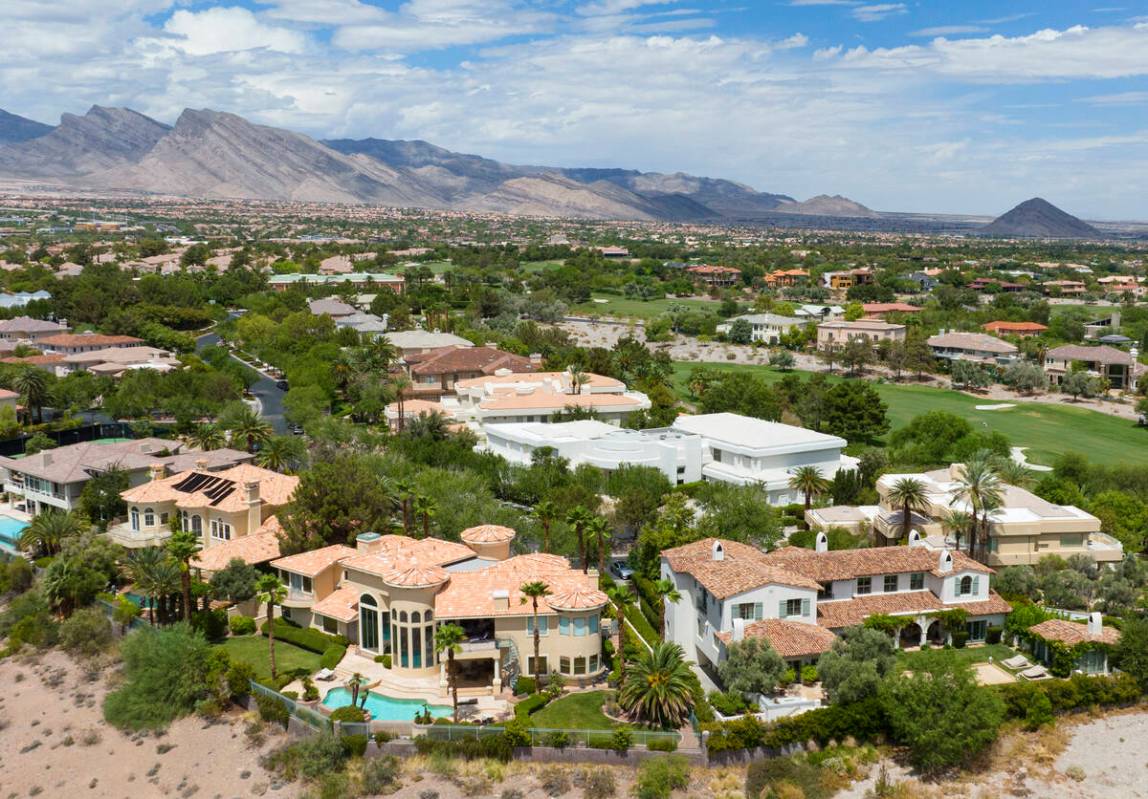 An aerial photo shows homes near Summerlin Parkway and Rampart Boulevard in Summerlin. (Bizuaye ...