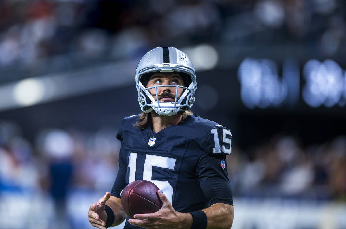 Raiders quarterback Gardner Minshew (15) looks to the stands as they face the Dallas Cowboys fo ...