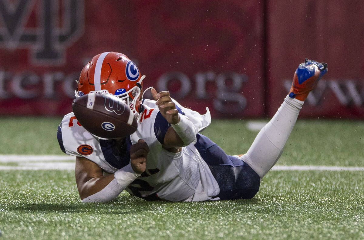 Bishop Gorman quarterback Melvin Spicer IV (2) attempts to grab a fumble against Mater Dei duri ...