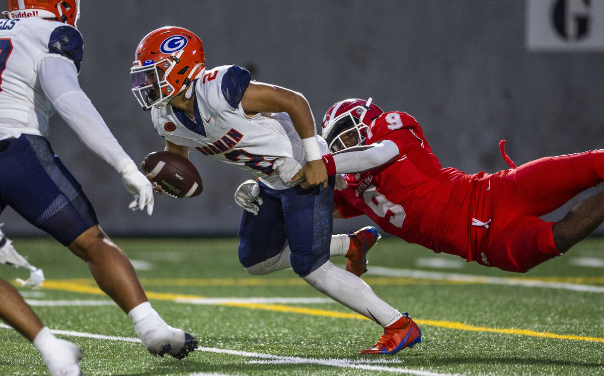 Bishop Gorman quarterback Melvin Spicer IV (2) is caught from behind by Mater Dei linebacker Da ...