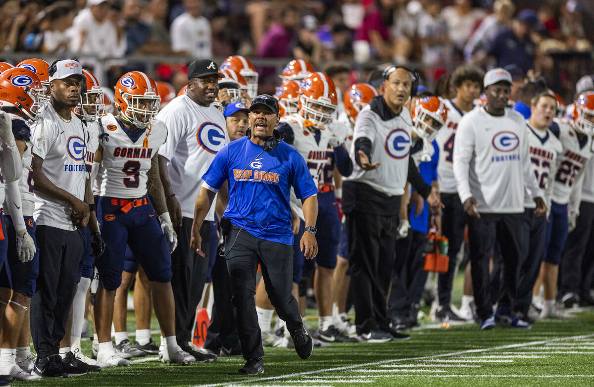 Bishop Gorman head coach Brent Browner yells at officials while running down the sidelines to f ...