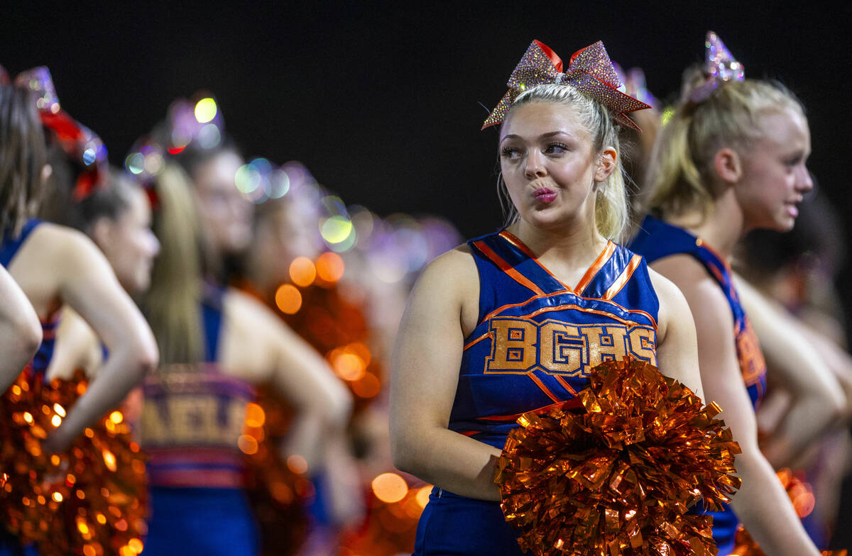 A Bishop Gorman cheerleader is a bit dismayed as Mater Dei dominates during the second half of ...