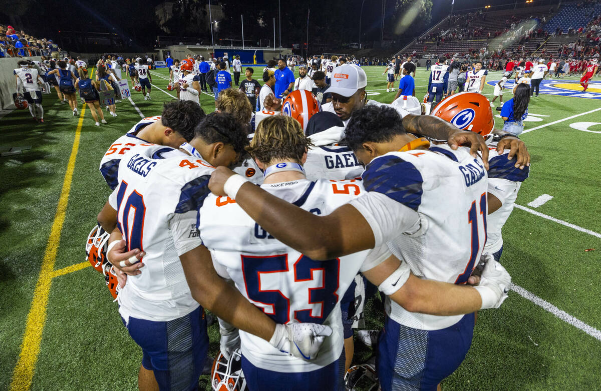 Bishop Gorman players gather together after a loss to Mater Dei in their high school football g ...