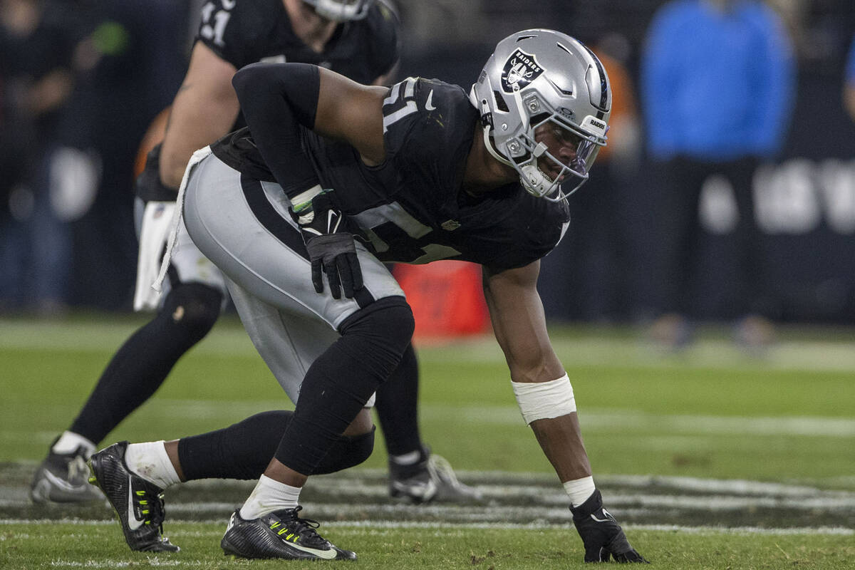 Raiders defensive end Malcolm Koonce (51) sets on the line of scrimmage during the second half ...