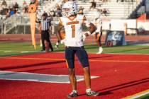 Legacy senior Dominic Oliver (1) celebrates after scoring a touchdown during the Class 5A high ...