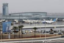 Fog lingers over Harry Reid International Airport, on Monday, Jan. 22, 2024, in Las Vegas. (Biz ...