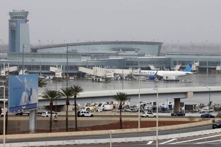 Fog lingers over Harry Reid International Airport, on Monday, Jan. 22, 2024, in Las Vegas. (Biz ...