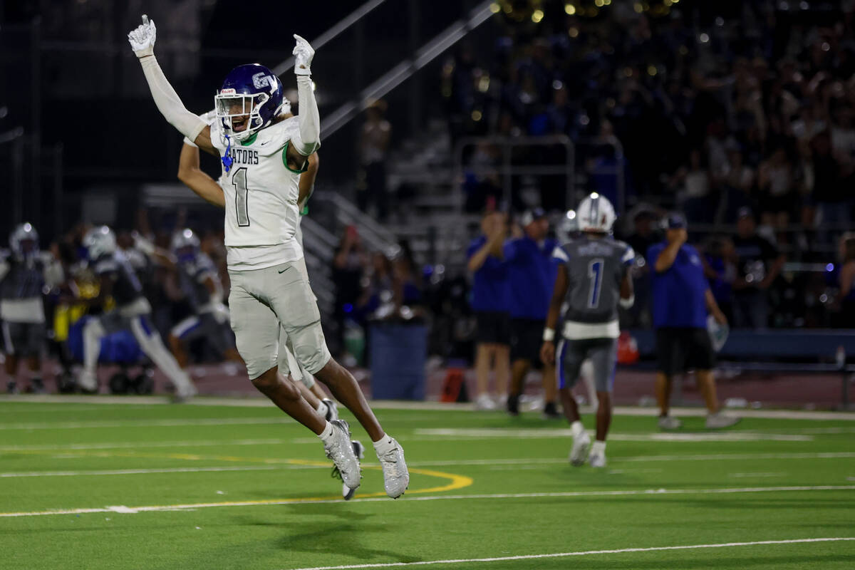 Green Valley wide receiver Trey Glasper celebrates as his team wins a high school football game ...