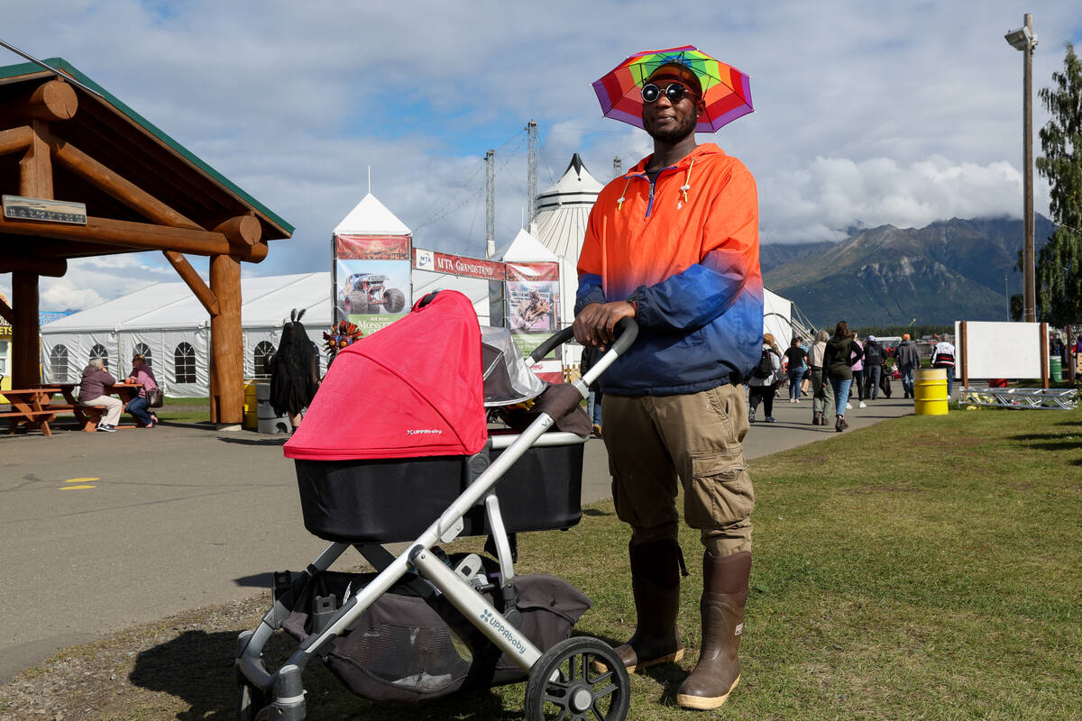 Justin Warren, an Alaska resident originally from New York, poses at the Alaska State Fair on T ...