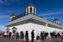 People wait in line to buy lottery tickets at The Lotto Store at Primm, just inside the Califor ...