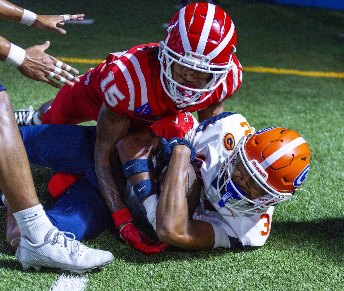 Bishop Gorman cornerback Hayden Stepp (32) comes down with the ball though Mater Dei wide recei ...