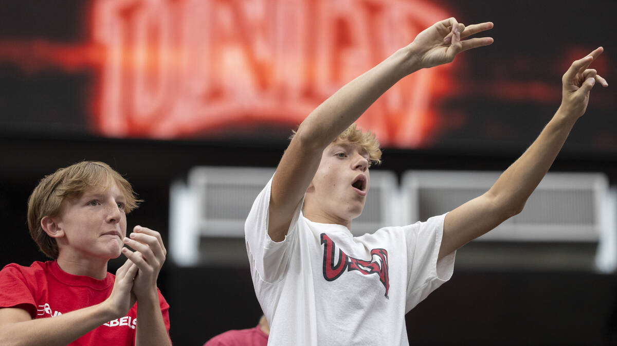 UNLV fans cheer during the college football game against Utah Tech at Allegiant Stadium, Saturd ...