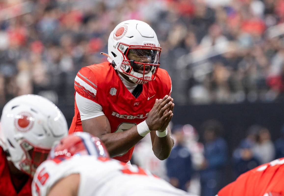 UNLV quarterback Hajj-Malik Williams (6) prepares to snap the ball during the college football ...