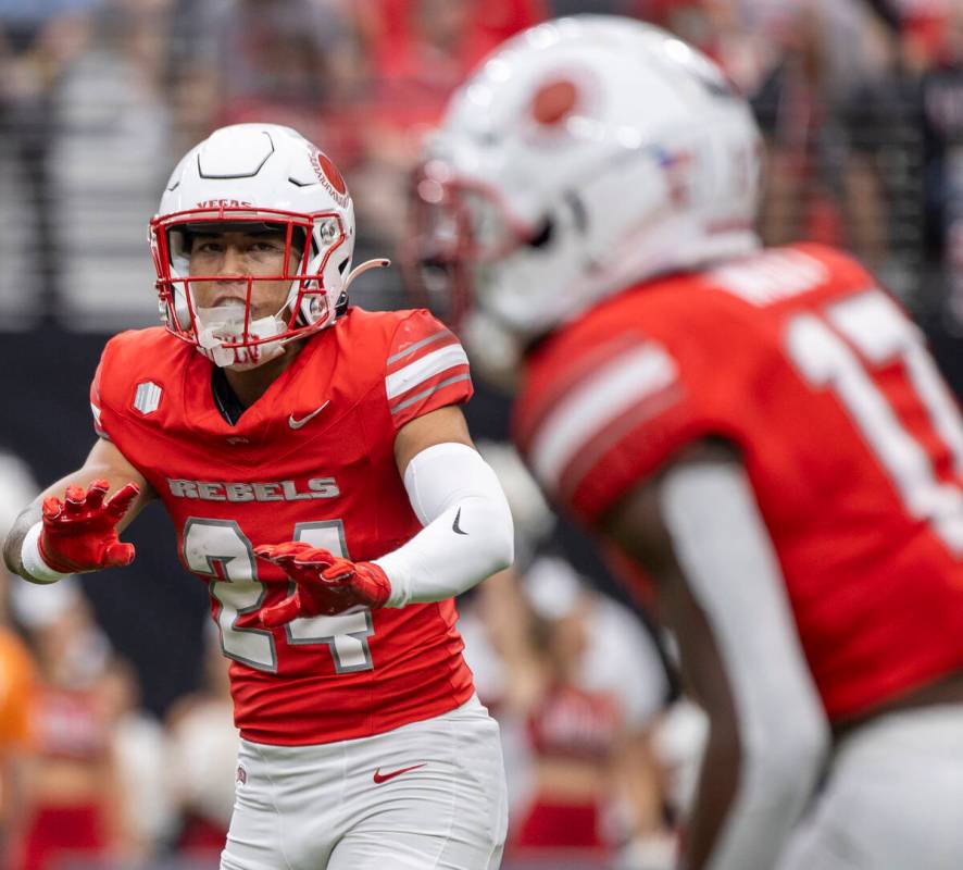 UNLV defensive back Kodi DeCambra (24) yells instructions to defensive back La'Vario Wiley (17) ...