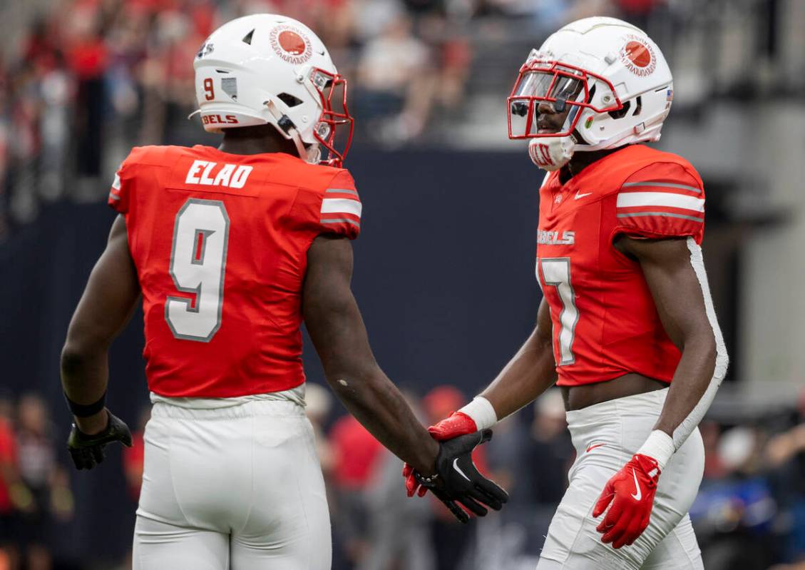 UNLV defensive back Jett Elad (9) and defensive back La'Vario Wiley (17) high-five during the c ...