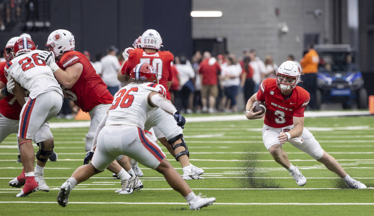 UNLV quarterback Matthew Sluka (3) runs with the ball during the college football game against ...