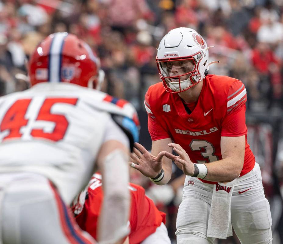 UNLV quarterback Matthew Sluka (3) prepares to snap the ball during the college football game a ...