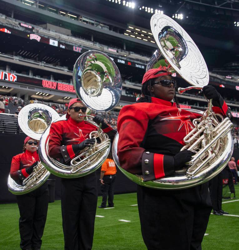 UNLV Star of Nevada Marching Band sousaphones wait to take the field before the college footbal ...