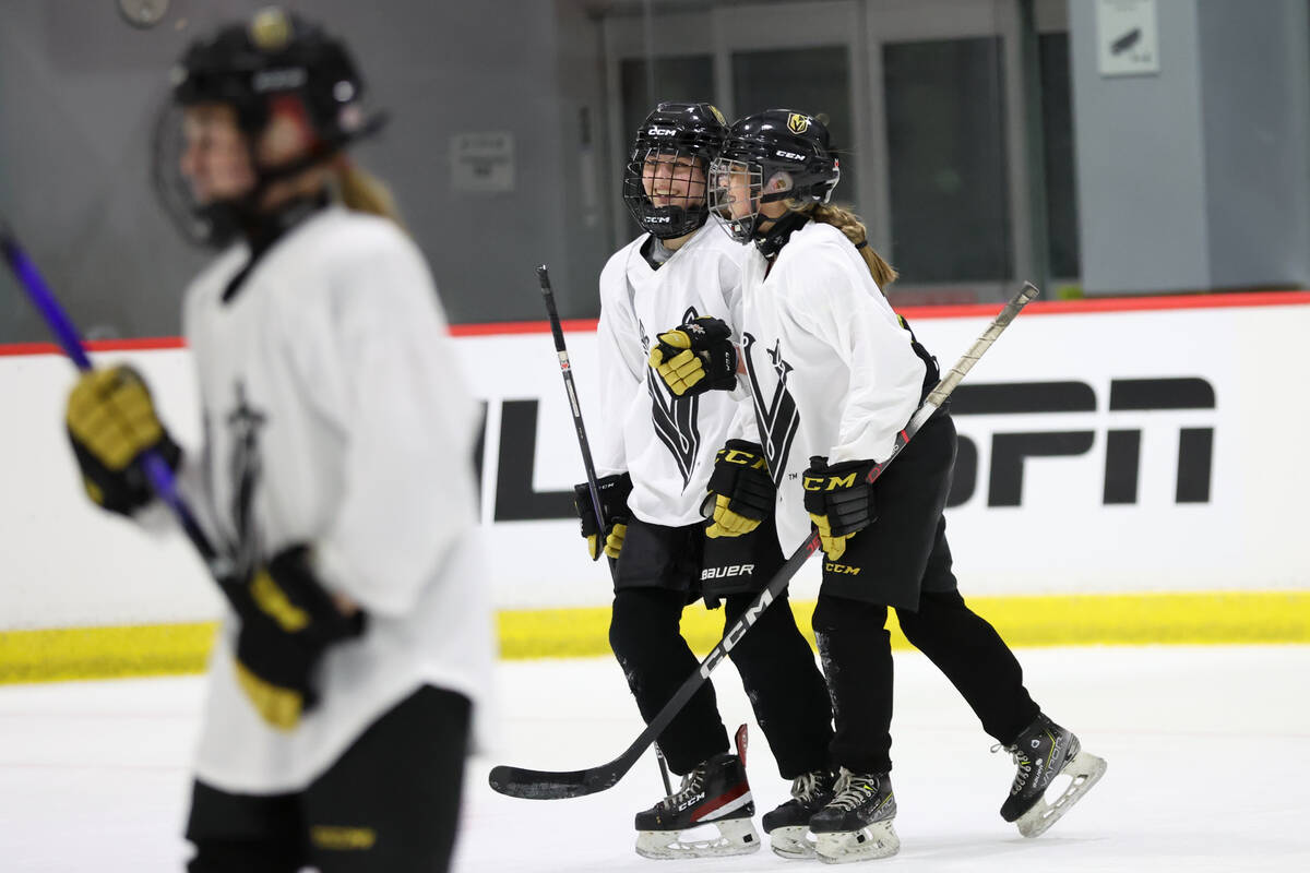 Vegas Jr. Golden Knights 14U Girls team players celebrate a goal during practice at America Fir ...